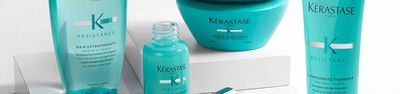Gamme de produits capillaires Kerastase Resistance, notamment un shampoing, un serum et un masque, presentes sur un fond clair.