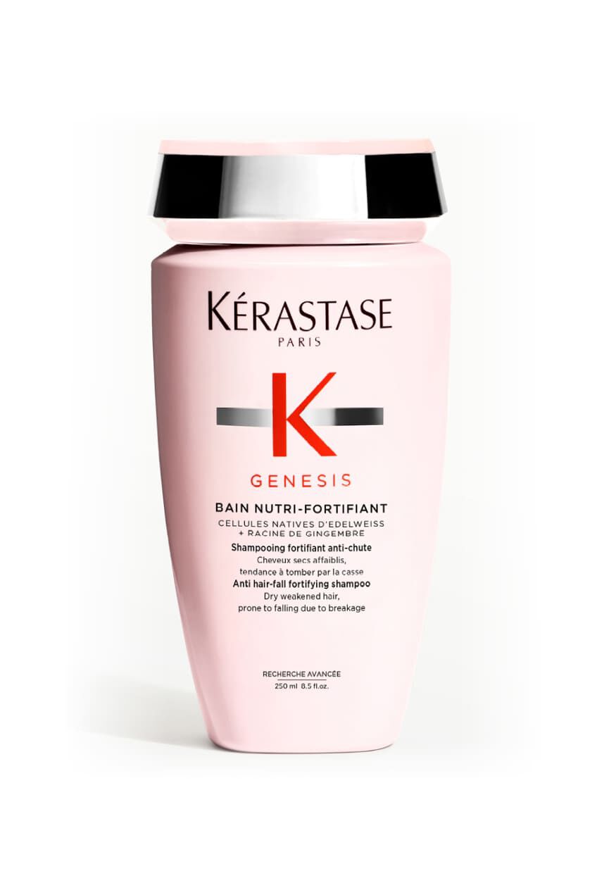 Opakrosa Flasche des Kerastase Genesis Bain Nutri-Fortifiant Shampoos fur trockenes und geschwachtes Haar.