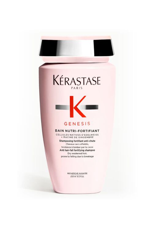 Opakrosa Flasche des Kerastase Genesis Bain Nutri-Fortifiant Shampoos fur trockenes und geschwachtes Haar.