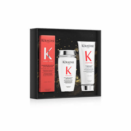 Ein Kerastase Pflege-Set in einer eleganten Box mit Shampoo, Conditioner und Stylingcreme.