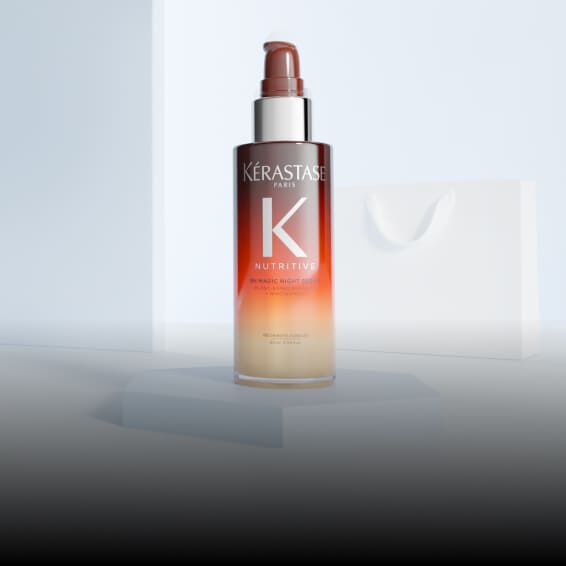 Orangefarbene Flasche des Nutritive Serum Nuit 8H von Kerastase.