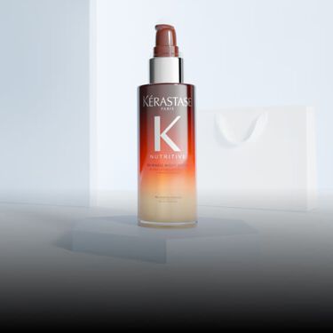 Orangefarbene Flasche des Nutritive Serum Nuit 8H von Kerastase.