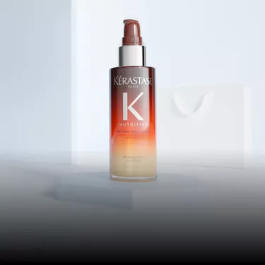 Orangefarbene Flasche des Nutritive Serum Nuit 8H von Kerastase.
