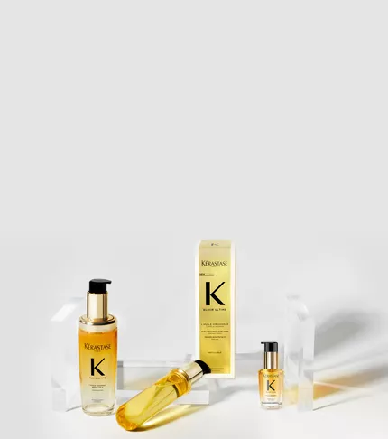 Die Produktreihe Elixir Ultime auf einem Glassockel.