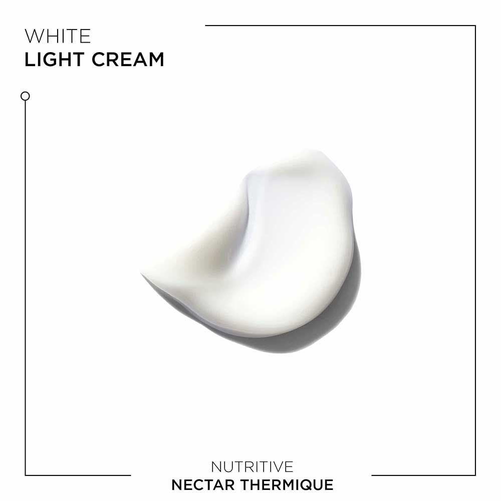 Ein Klecks weißer leichter Creme auf einem weißen Hintergrund, beschriftet mit 'NURITIV NEKTAR THERMIQUE'.